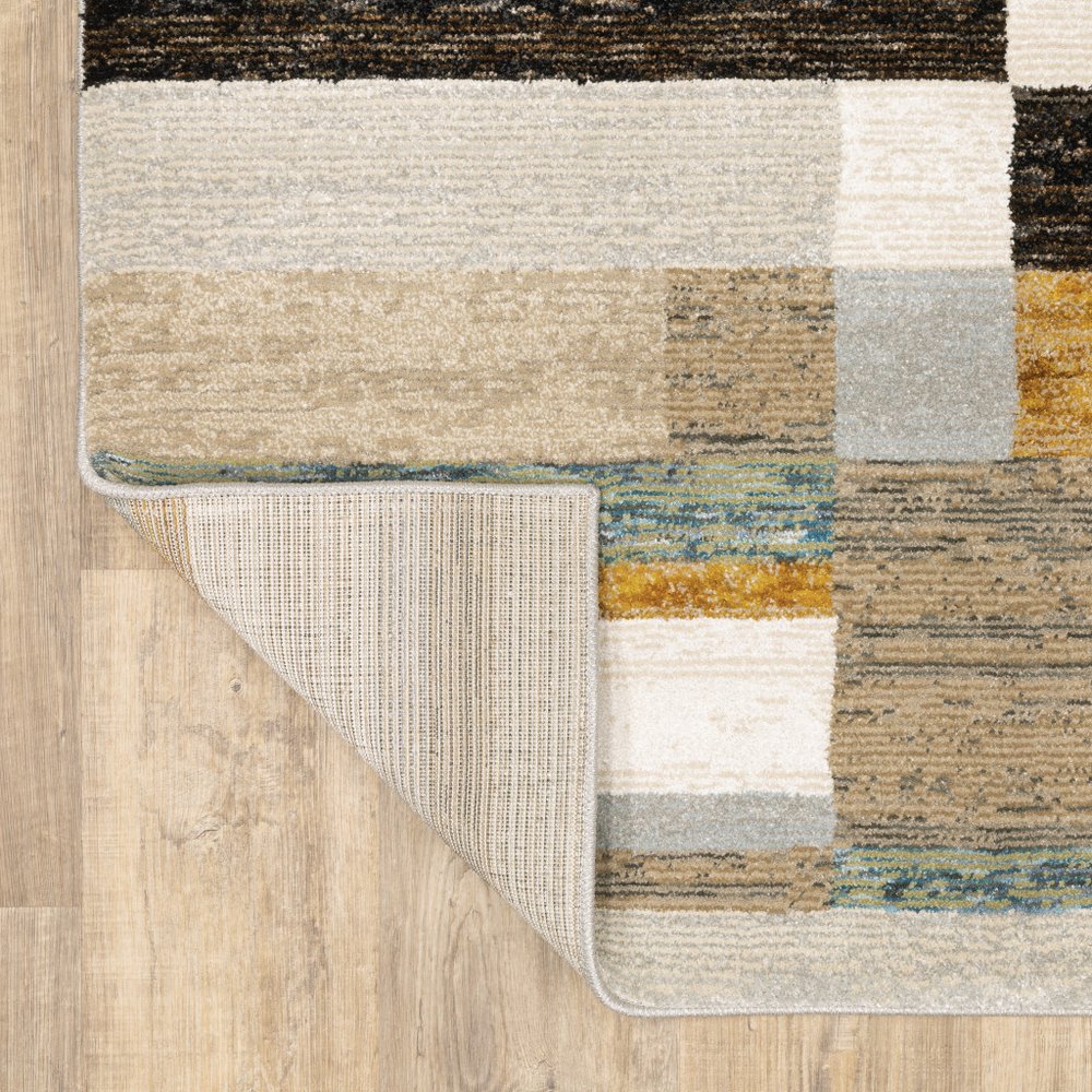 5' X 7' Beige Gold Black Grey Tan Teal and Rust Geometric Power Loom Area Rug