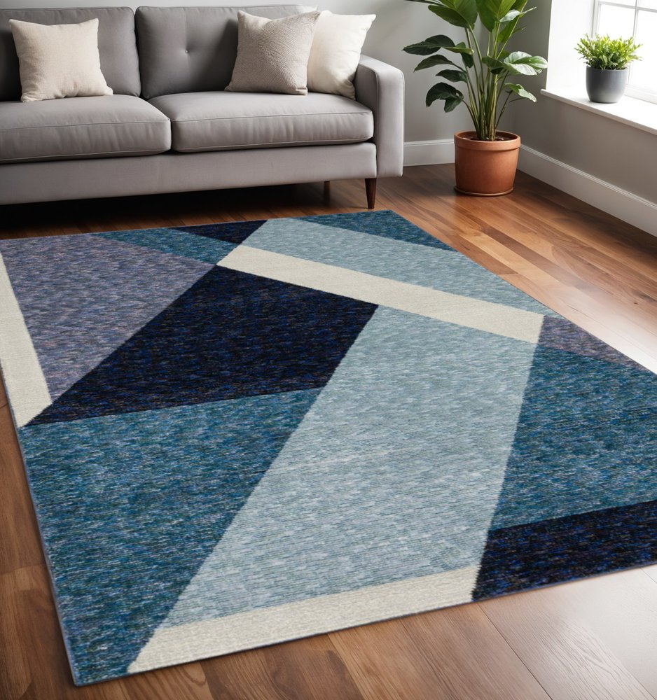 5' X 7' Blue Purple Grey and Teal Geometric Power Loom Area Rug