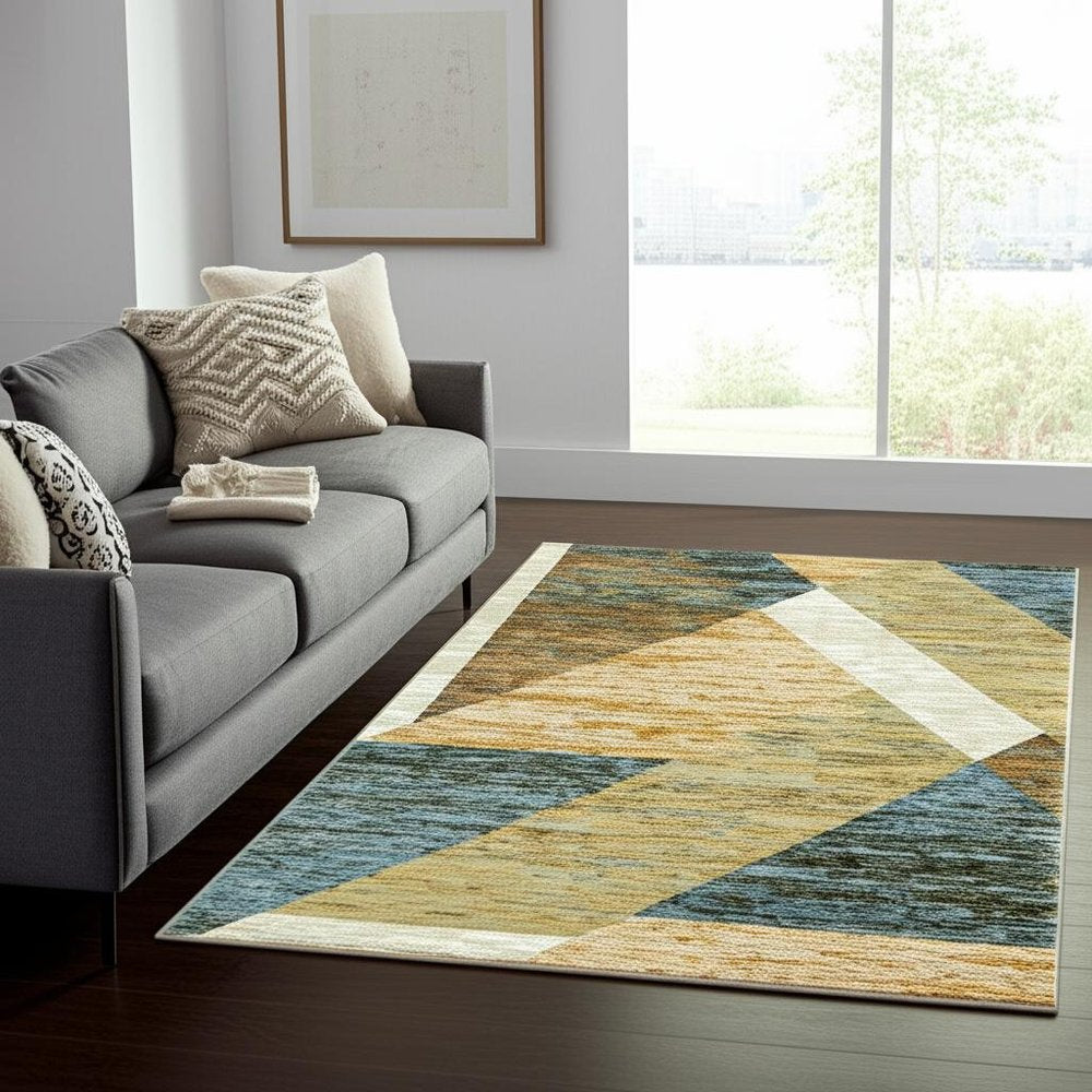 5' X 7' Blue and Beige Geometric Power Loom Area Rug