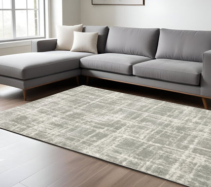 8' X 11' Gray and Ivory Abstract Shag Power Loom Area Rug