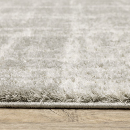 8' X 11' Gray and Ivory Abstract Shag Power Loom Area Rug