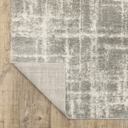 8' X 11' Gray and Ivory Abstract Shag Power Loom Area Rug