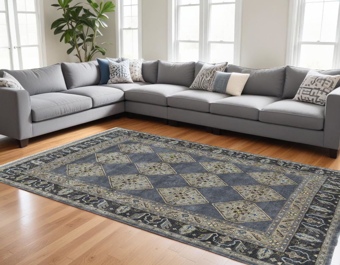 5' X 8' Blue Gray And Taupe Wool Floral Hand Knotted Stain Resistant Area Rug