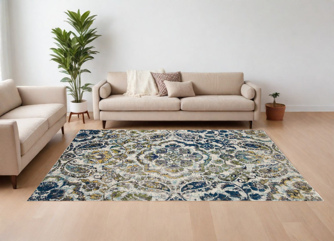 7' X 10' Ivory Blue And Green Floral Stain Resistant Area Rug