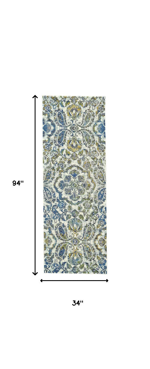 7' X 10' Ivory Blue And Green Floral Stain Resistant Area Rug