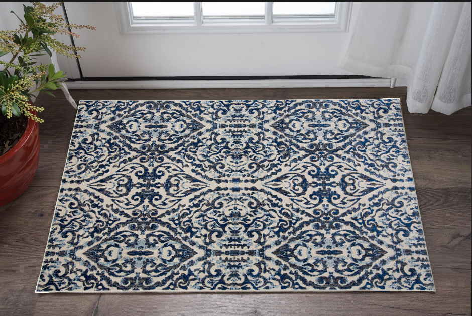 10' X 14' Blue Ivory And Black Floral Distressed Stain Resistant Area Rug