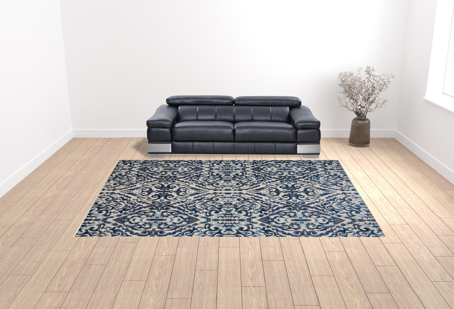 10' X 14' Blue Ivory And Black Floral Distressed Stain Resistant Area Rug