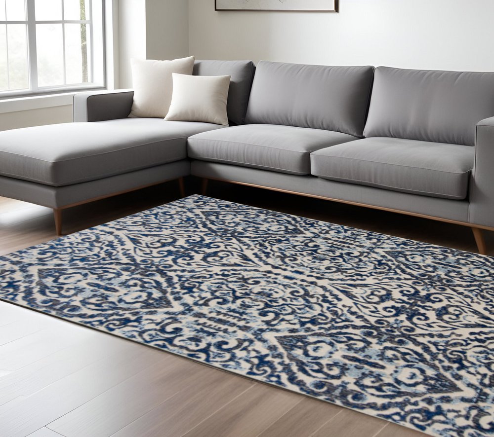 9' Blue and Ivory Round Floral Distressed Area Rug