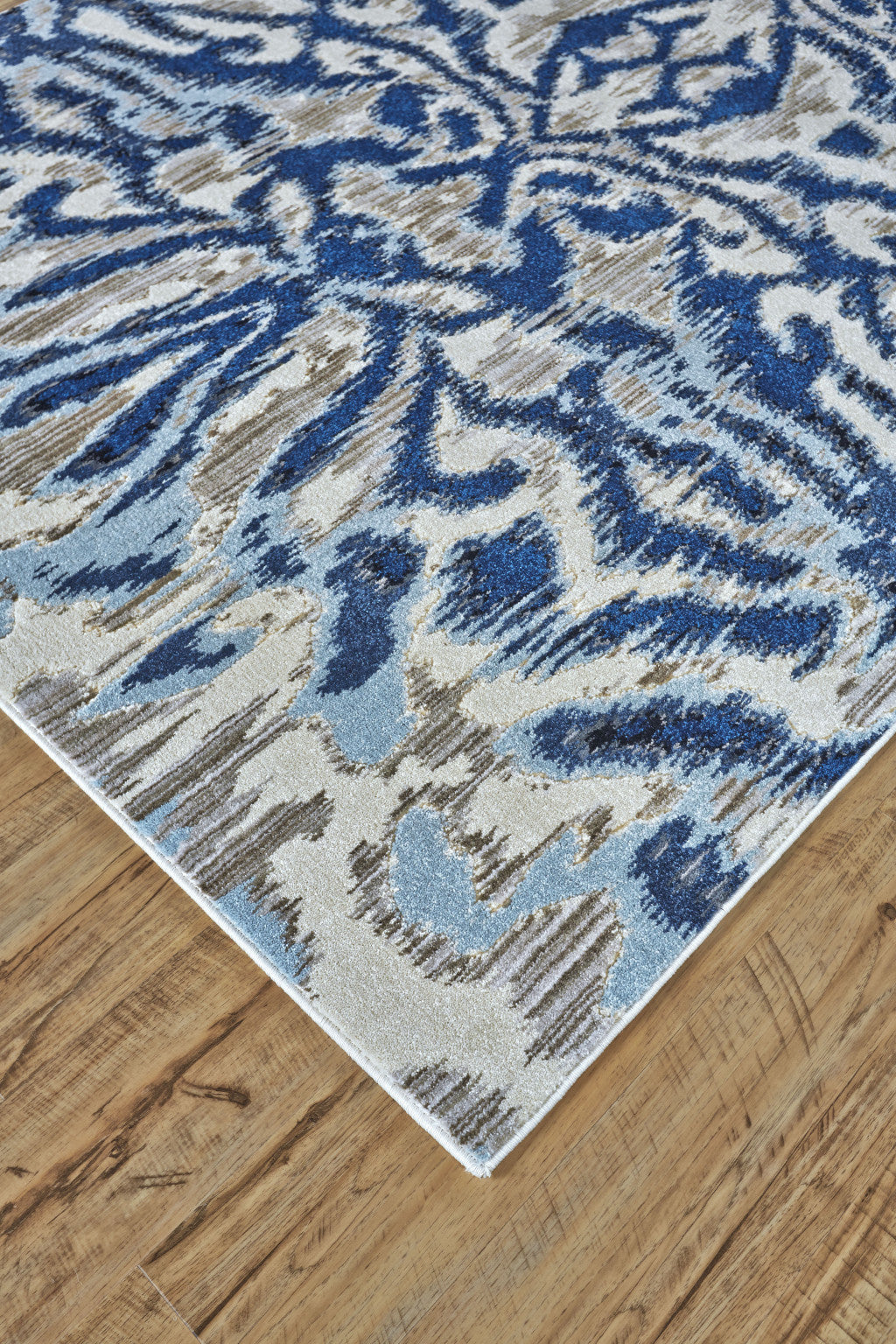 '9' Blue Taupe And Ivory Round Ikat Distressed Stain Resistant Area Rug