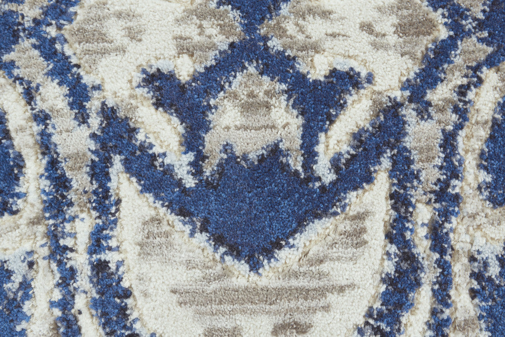 5' X 8' Blue Taupe And Ivory Ikat Distressed Area Rug