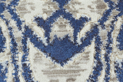 9' Ivory Blue And Gray Ikat Distressed Round Rug