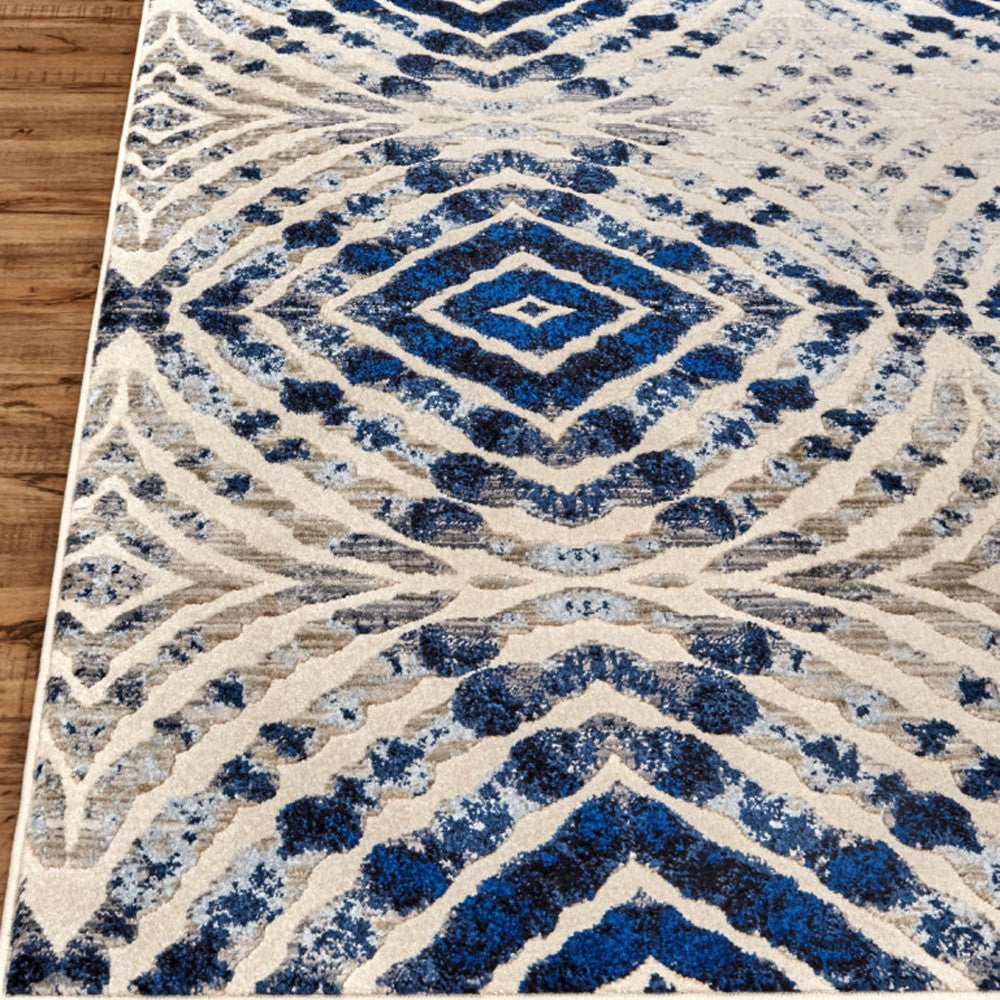 2' X 4' Ivory Blue And Gray Abstract Distressed Stain Resistant Area Rug