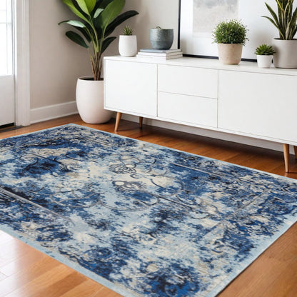 9' Blue And Ivory Floral Distressed Round Rug