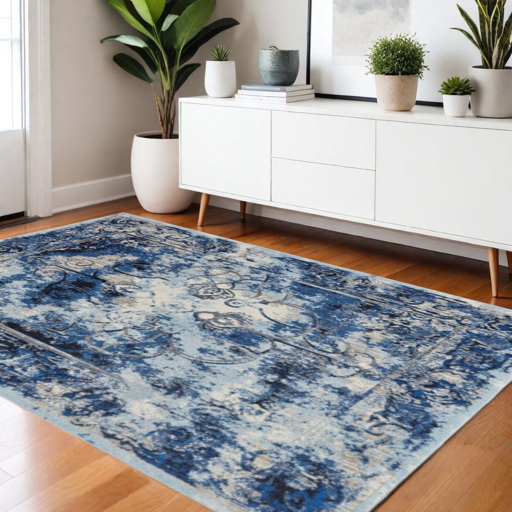 4' X 6' Blue Ivory And Gray Floral Distressed Stain Resistant Area Rug