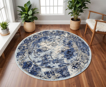 9' Blue And Ivory Floral Distressed Round Rug