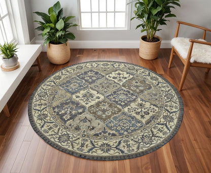 10' X 13' Gray Ivory And Blue Wool Floral Hand Tufted Area Rug