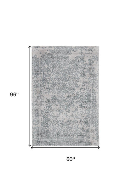 5' X 8' Blue and Gray Abstract Hand Woven Area Rug