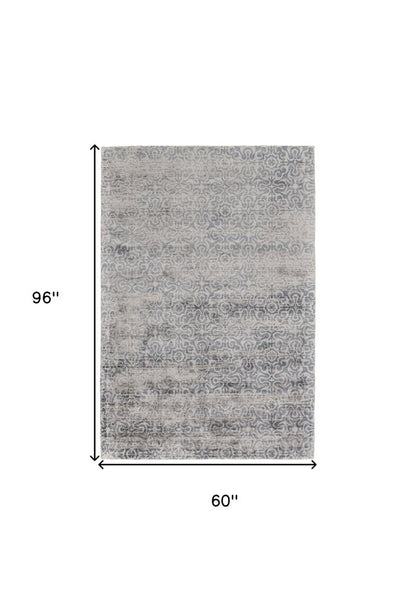 5' X 8' Gray and Ivory Abstract Hand Woven Area Rug