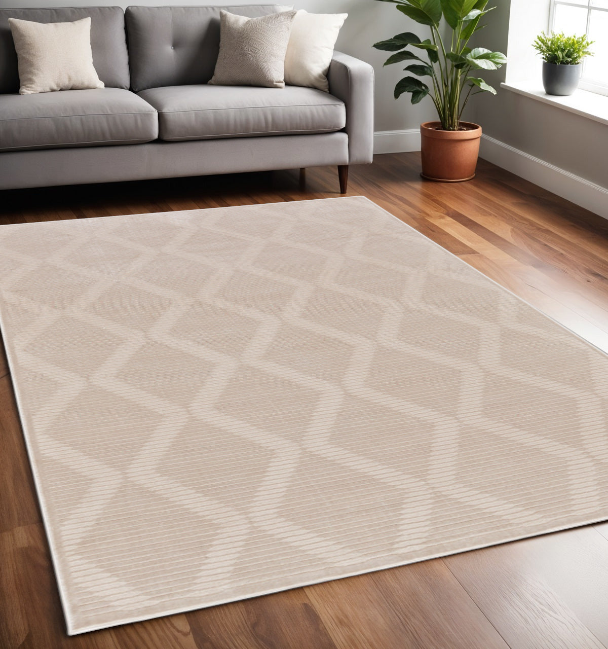 10' X 13' Ivory And Tan Geometric Stain Resistant Area Rug