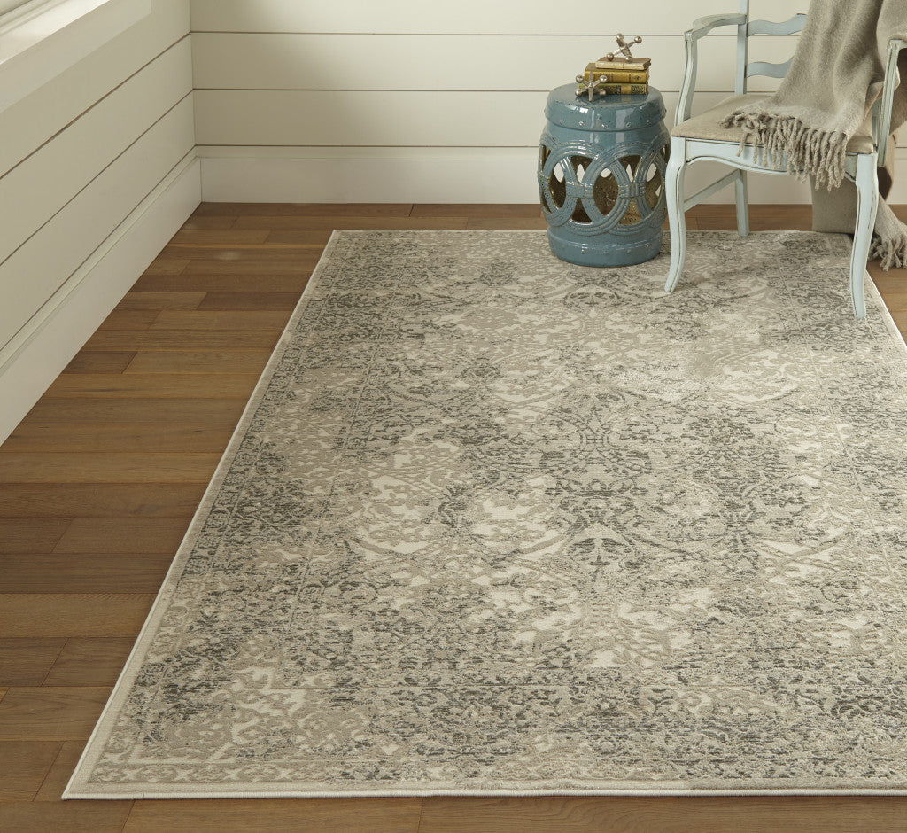 5' X 8' Ivory Gray And Black Abstract Stain Resistant Area Rug