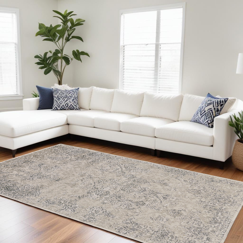 5' X 8' Ivory Gray And Black Abstract Stain Resistant Area Rug