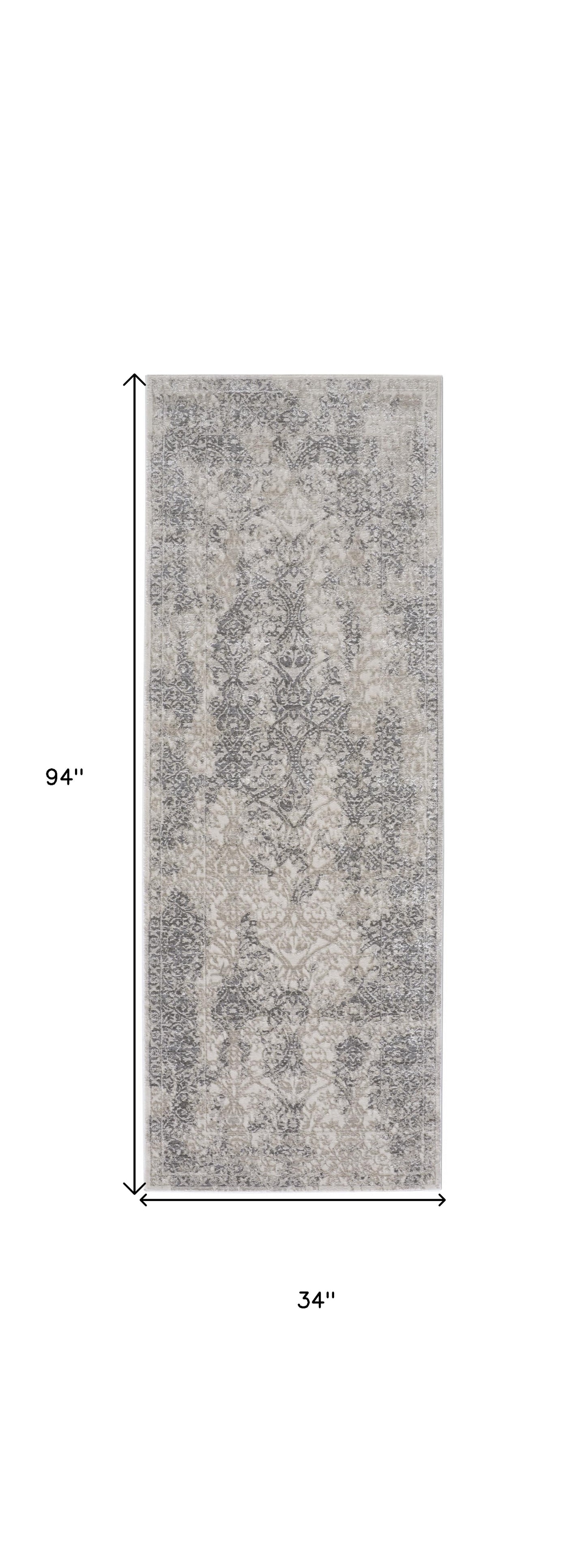 5' X 8' Ivory Gray And Black Abstract Stain Resistant Area Rug