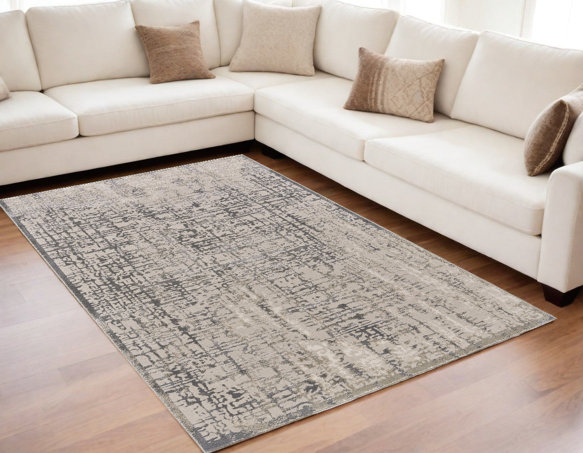 5' X 8' Gray And Ivory Abstract Stain Resistant Area Rug