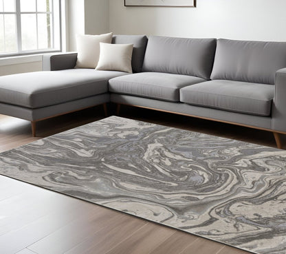 5' X 8' Gray Ivory And Silver Abstract Area Rug