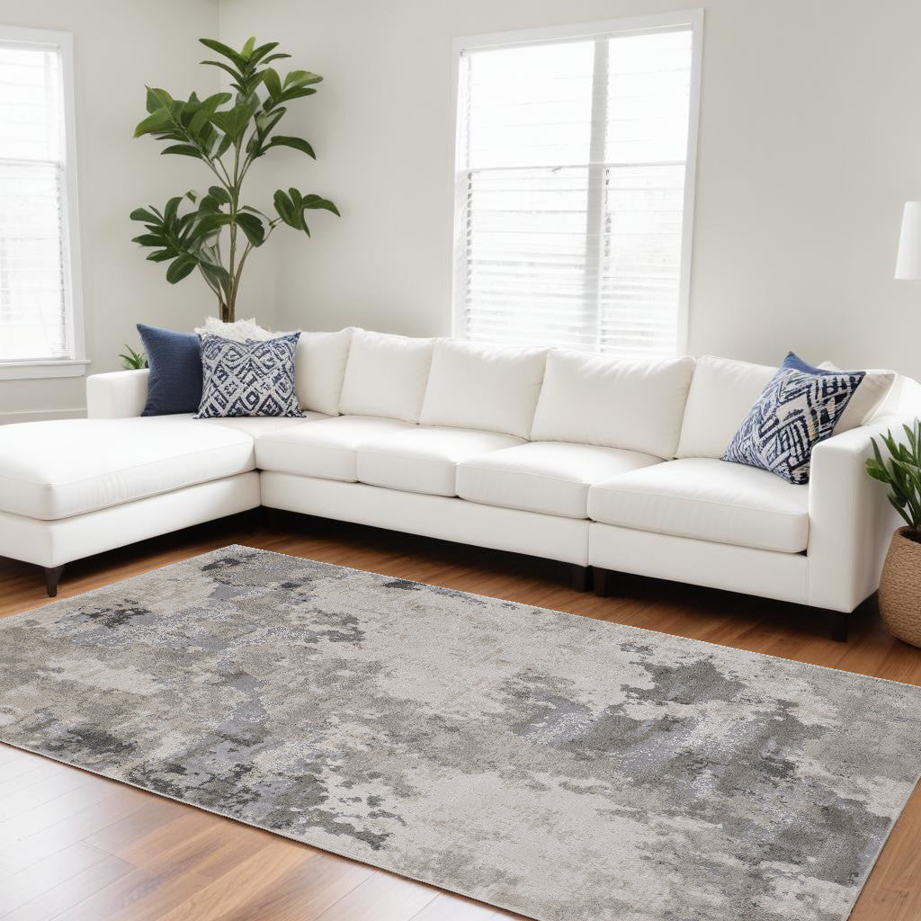 5' X 8' Ivory And Gray Abstract Stain Resistant Area Rug