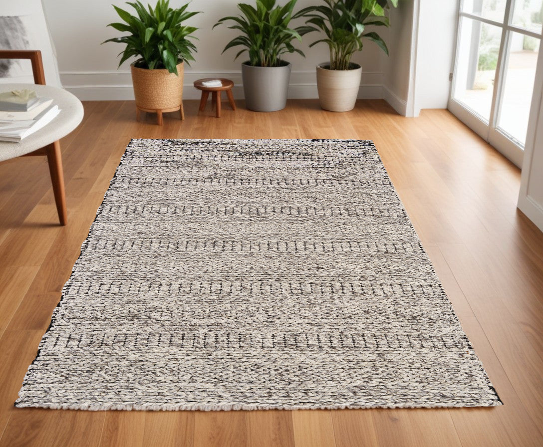 5' X 8' Gray and Ivory Wool Hand Woven Area Rug