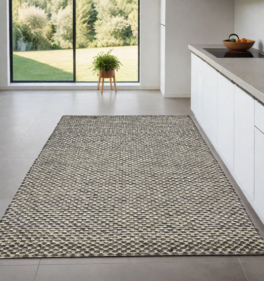 5' X 8' Gray and Ivory Wool Floral Hand Woven Area Rug