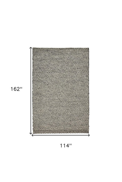 5' X 8' Gray and Ivory Wool Floral Hand Woven Area Rug