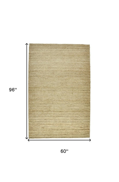 5' X 8' Tan Ivory And Taupe Hand Woven Area Rug
