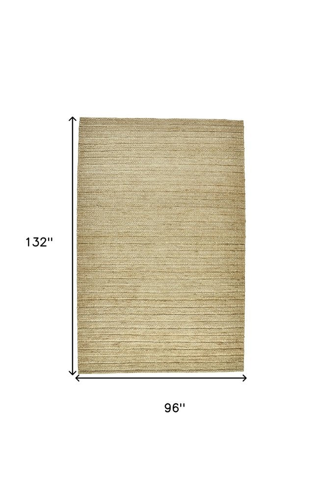 5' X 8' Tan Ivory And Taupe Hand Woven Area Rug