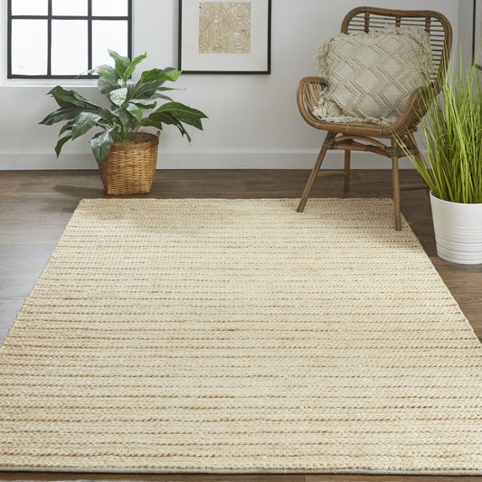2' X 3' Tan Ivory And Taupe Hand Woven Area Rug