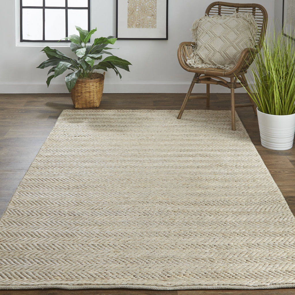 5' X 8' Tan Orange And Brown Hand Woven Area Rug