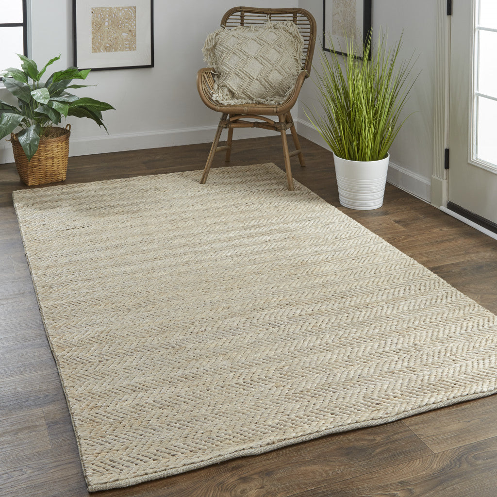 5' X 8' Tan Orange And Brown Hand Woven Area Rug