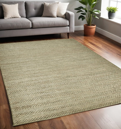 5' X 8' Tan And Gray Hand Woven Area Rug
