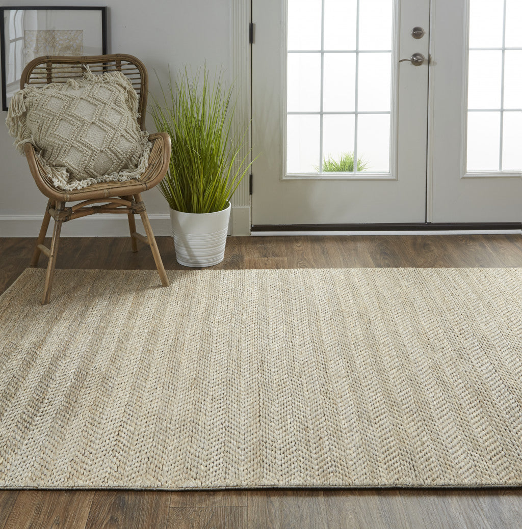 5' X 8' Tan And Gray Hand Woven Area Rug