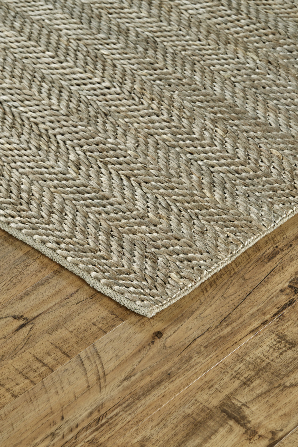 5' X 8' Tan And Gray Hand Woven Area Rug