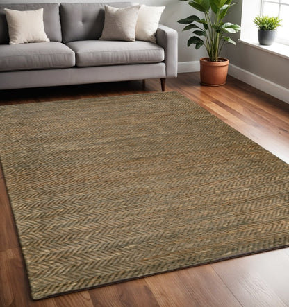 5' X 8' Tan And Gray Hand Woven Area Rug