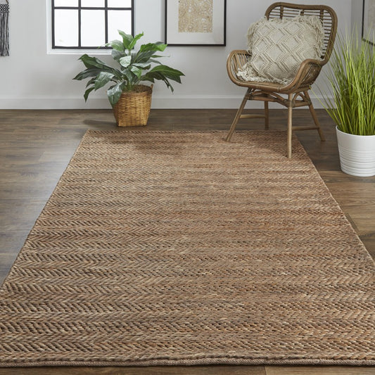 5' X 8' Brown And Gray Hand Woven Area Rug