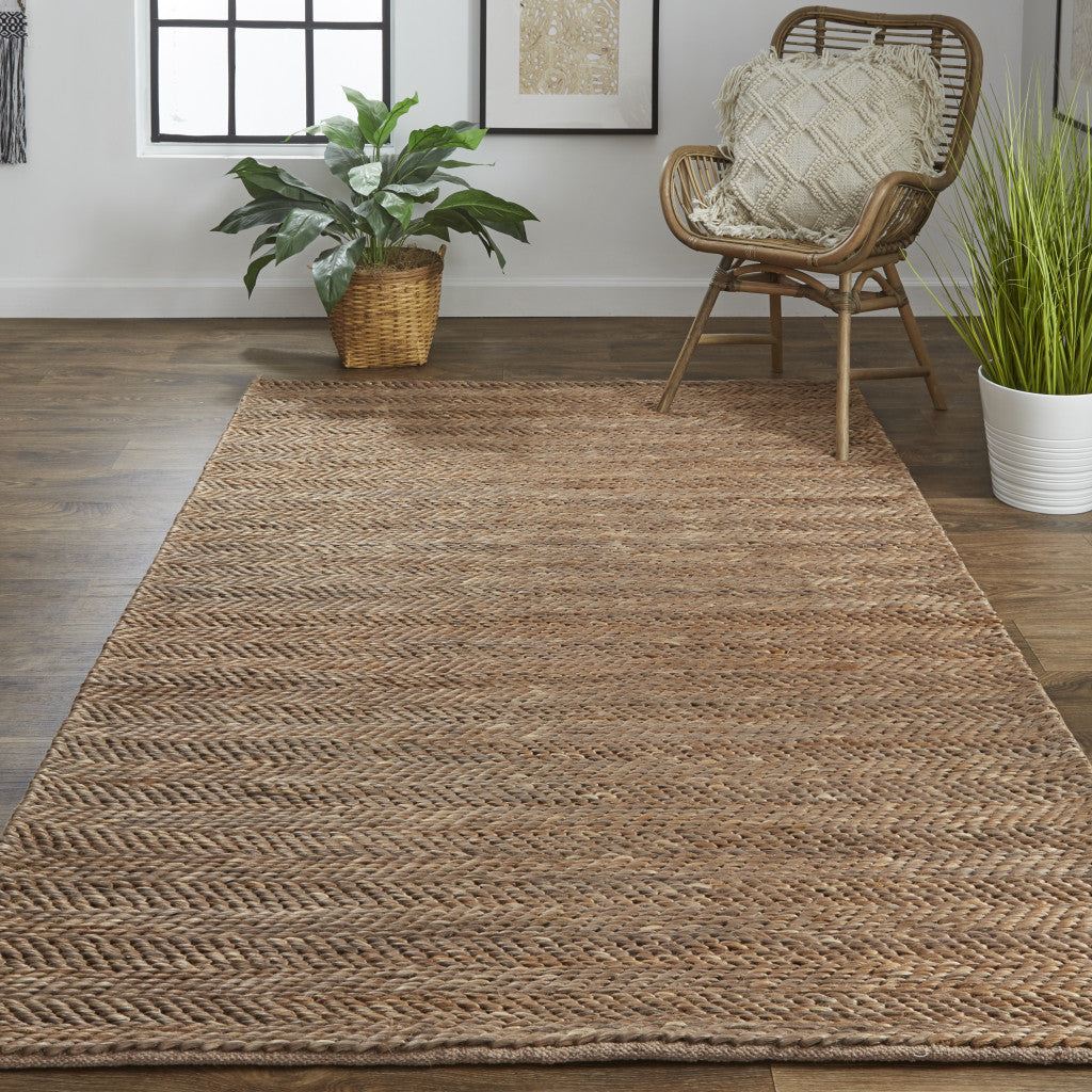 5' X 8' Tan And Gray Hand Woven Area Rug