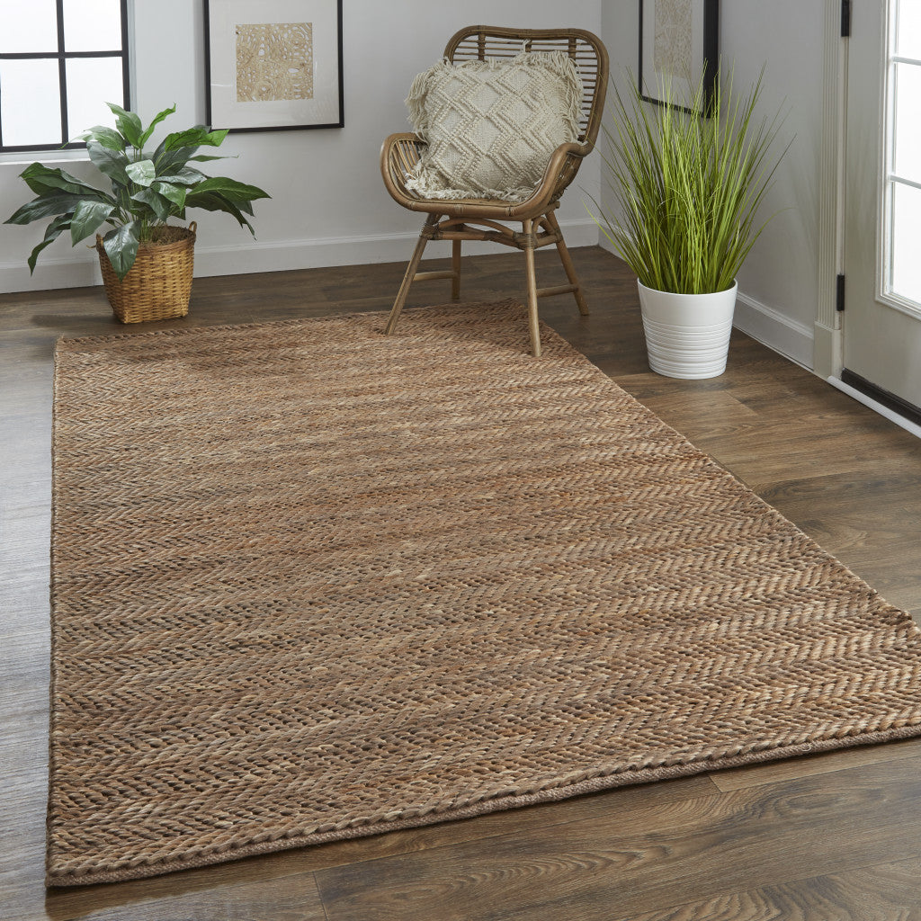 5' X 8' Tan And Gray Hand Woven Area Rug