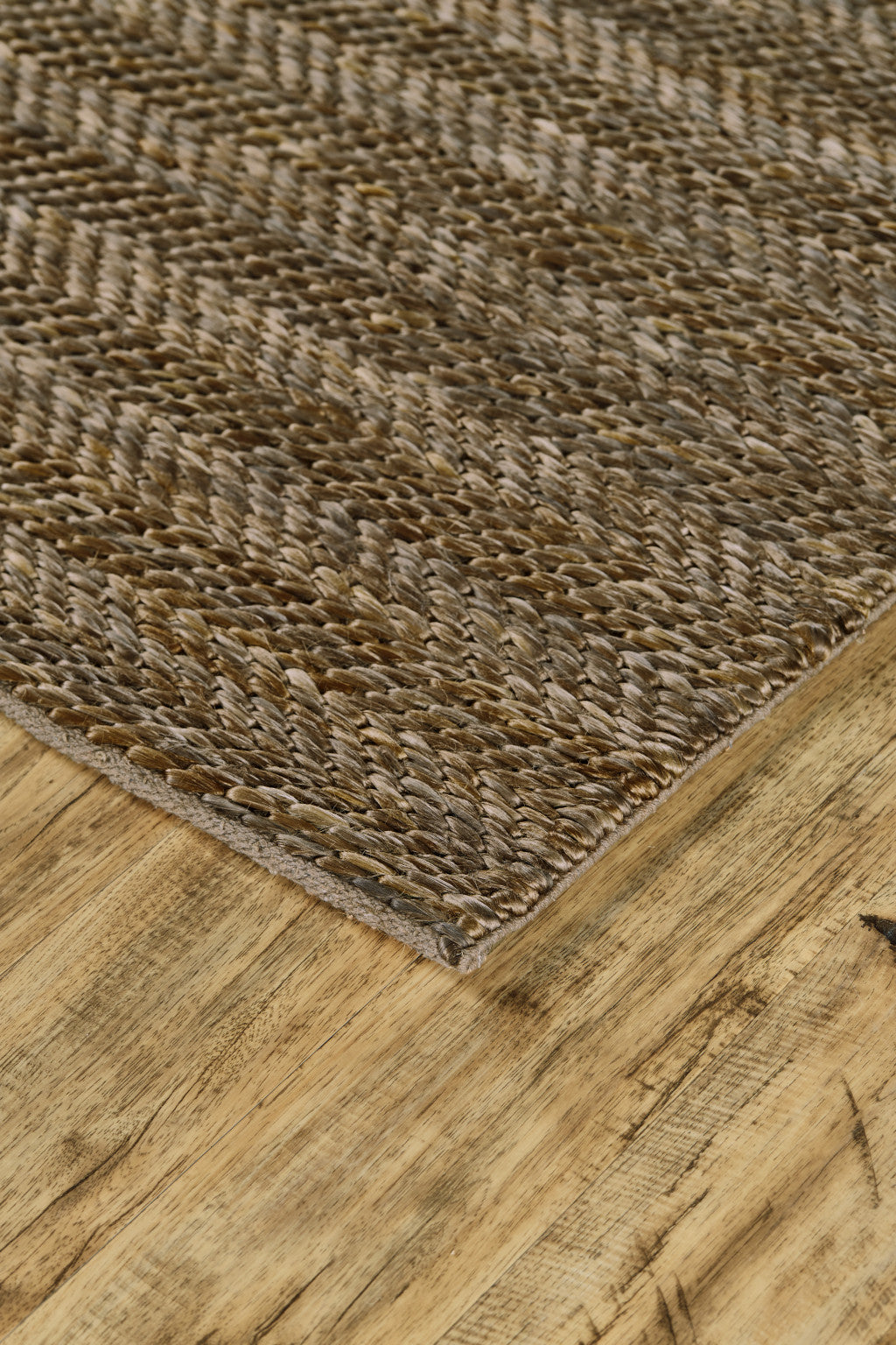 5' X 8' Tan And Gray Hand Woven Area Rug