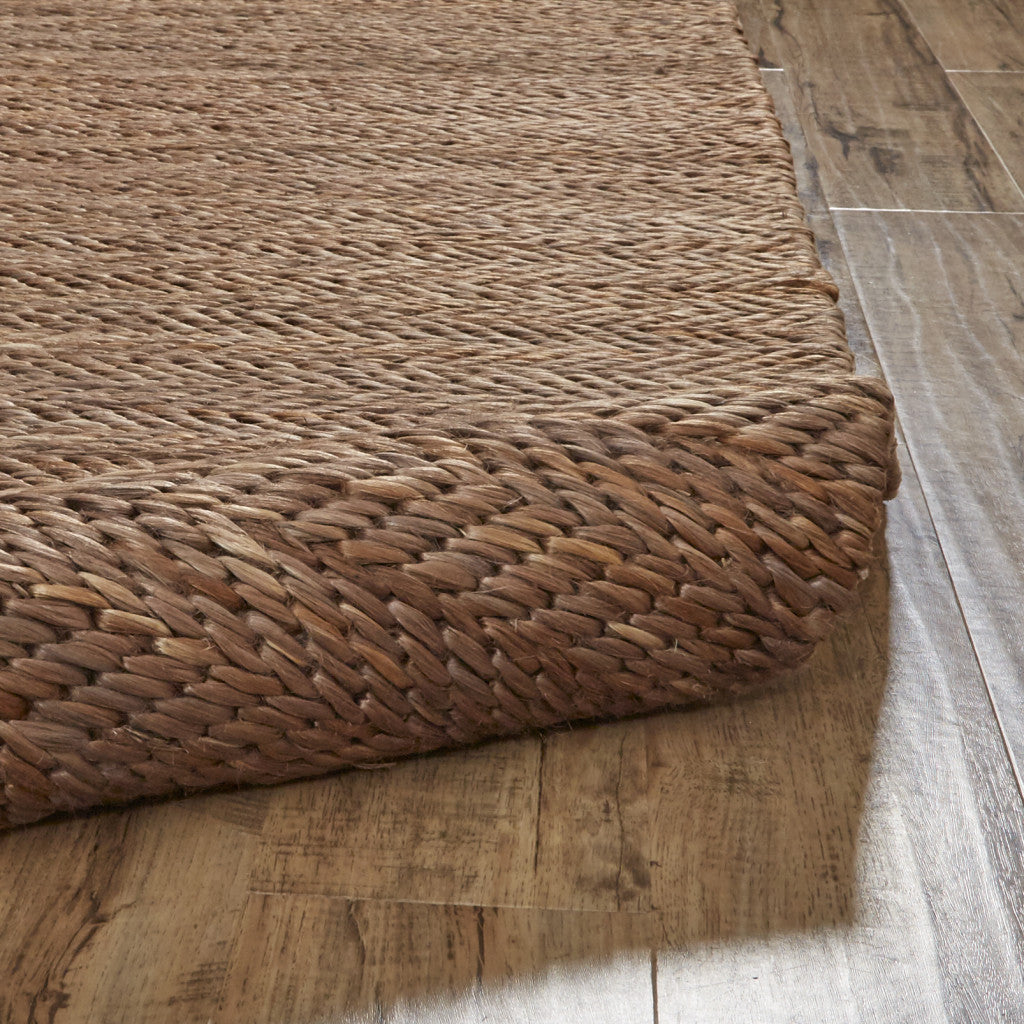 5' X 8' Tan And Gray Hand Woven Area Rug