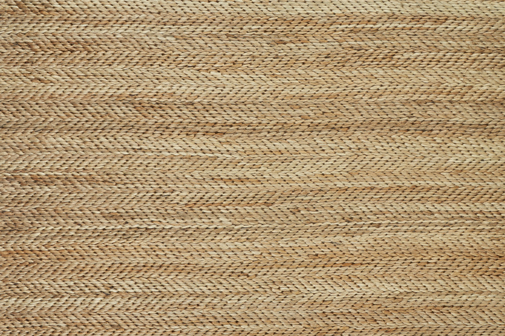 5' X 8' Tan Orange And Brown Hand Woven Area Rug