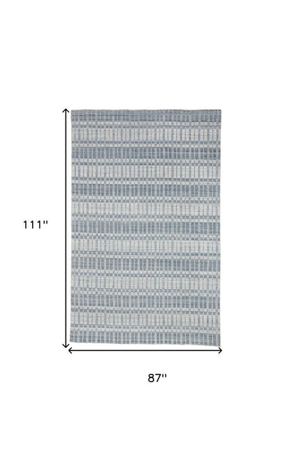 7' X 9' Ivory And Blue Striped Hand Woven Area Rug