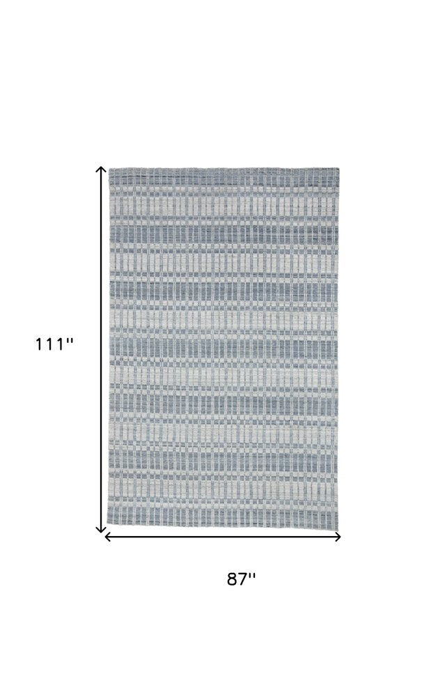 7' X 9' Ivory And Blue Striped Hand Woven Area Rug