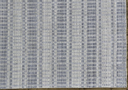 7' X 9' Ivory And Blue Striped Hand Woven Area Rug